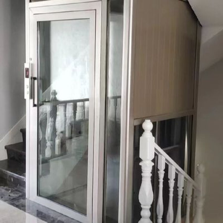 custom glass cabin hydraulic elevator 5 floors pitless design.jpg