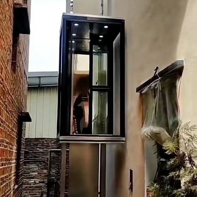 Naked cabin hydraulic home elevator with an open frame and a platform, published for a five floor shaftless residential lift
